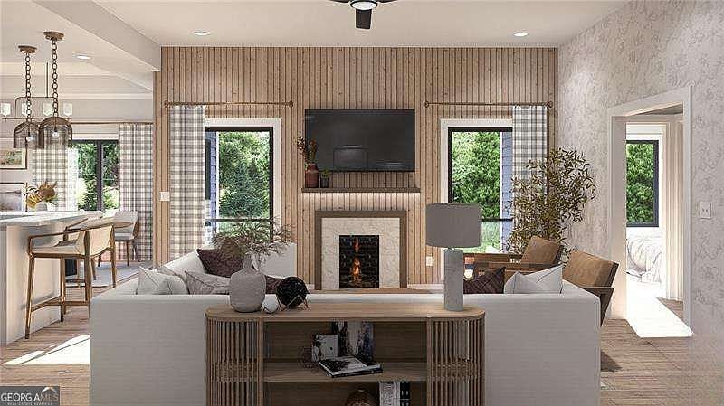 Open-concept living room with fireplace and natural light